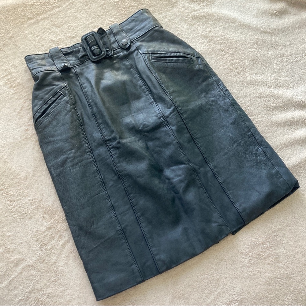 Vintage 90s black leather skirt with belt buckle detail